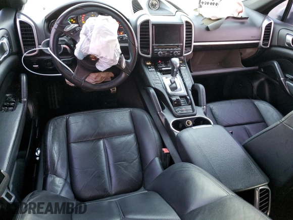 2013 Porsche Cayenne S с VIN WP1AB2A28DLA85229, выставлен на аукционе Copart как лот 50935415 с пробегом 215 629 миль миль и Списание • Salvage title. История ставок и продаж доступна на DreamBid. Изображение 8.