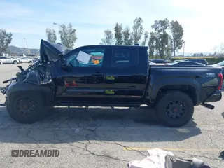 2025 Toyota Tacoma SR with VIN 3TMLB5JN2SM090007, listed as a IAAI auction lot 41830185 with 4,359 mi miles and . Bid and sale history available at DreamBid. Image 14.