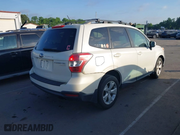 2015 Subaru Forester Premium with VIN JF2SJADCXFH524011, listed as a IAAI auction lot 42181168 with 195,654 mi miles and . Bid and sale history available at DreamBid. Image 4.