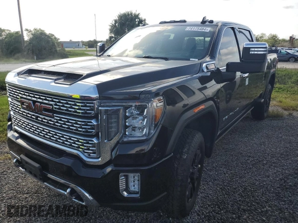 2023 GMC Sierra 3500HD Denali z VIN 1GT49WEY9PF135123, wystawiony jako Copart lot #74175484 z przebiegiem Nie podano mil oraz Nie do naprawy • Non repairable. Historia ofert i sprzedaży dostępna na DreamBid. Obrazek 1.