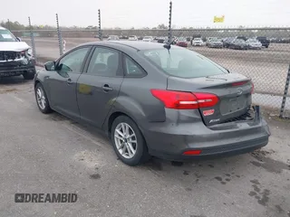 2017 Ford Focus SE with VIN 1FADP3F22HL299398, listed as a IAAI auction lot 41162384 with 121,993 mi miles and . Bid and sale history available at DreamBid. Image 3.