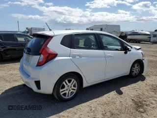 2015 Honda Fit LX with VIN 3HGGK5G55FM748175, listed as a Copart auction lot 56556915 with 98,858 mi miles and Salvage title. Bid and sale history available at DreamBid. Image 3.