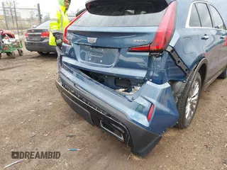 2024 Cadillac XT4 AWD Premium Luxury with VIN 1GYFZDR45RF143981, listed as a IAAI auction lot 42032787 with 14,700 mi miles and . Bid and sale history available at DreamBid. Image 6.