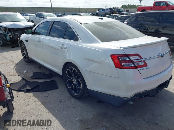 2015 Ford Taurus SHO with VIN 1FAHP2KT8FG202995, listed as a IAAI auction lot 41823964 with 79,720 mi miles and . Bid and sale history available at DreamBid. Image 3.