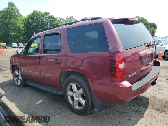 2007 Chevrolet Tahoe LTZ with VIN 1GNFK13007J153690, listed as a Copart auction lot 60614905 with 221,910 mi miles and Salvage title. Bid and sale history available at DreamBid. Image 2.