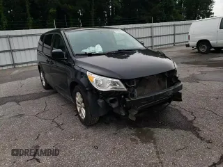 2014 Volkswagen Routan SE z VIN 2C4RVABG1ER134621, wystawiony jako Copart lot #61339414 z przebiegiem 153 364 mil mil oraz Szkoda całkowita • Salvage title. Historia ofert i sprzedaży dostępna na DreamBid. Obrazek 11.