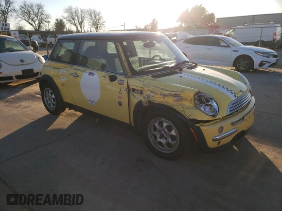 2002 MINI Hardtop with VIN WMWRC33422TC35953, listed as a Copart auction lot 42347465 with 126,890 mi miles and Salvage Title. Bid and sale history available at DreamBid. Image 4.