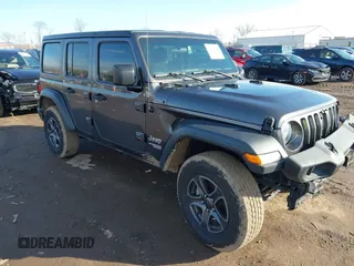 2018 Jeep Wrangler Unlimited Sport S with VIN 1C4HJXDN0JW255003, listed as a IAAI auction lot 41528394 with 55,660 mi miles and . Bid and sale history available at DreamBid. Image 1.