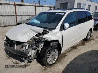 2010 Toyota Sienna XLE with VIN 5TDYK4CC8AS322250, listed as a Copart auction lot 62323705 with 249,005 mi miles and Salvage title. Bid and sale history available at DreamBid. Image 1.
