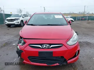 2012 Hyundai Accent GLS with VIN KMHCU4AEXCU168661, listed as a IAAI auction lot 41963258 with 216,006 mi miles. Bid and sale history available at carsss.com. Image 12.