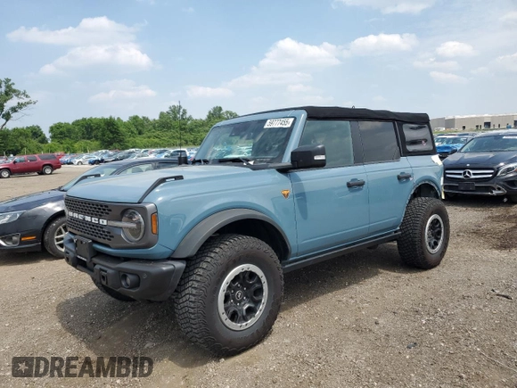 2022 Ford Bronco with VIN 1FMEE5DH7NLB89588, listed as a Copart auction lot 59777455 with 25,323 mi miles and Salvage title. Bid and sale history available at DreamBid. Image 1.