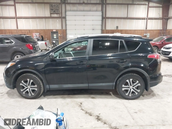 2017 Toyota RAV4 LE with VIN 2T3BFREV8HW571887, listed as a IAAI auction lot 41612815 with 100,742 mi miles and . Bid and sale history available at DreamBid. Image 15.
