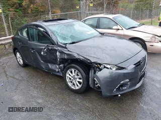 2014 Mazda 3 i Touring z VIN JM1BM1L76E1184728, wystawiony jako IAAI lot #41962258 z przebiegiem 200 544 mil mil oraz . Historia ofert i sprzedaży dostępna na DreamBid. Obrazek 1.