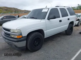 2005 Chevrolet Tahoe LS with VIN 1GNEC13V85J243672, listed as a IAAI auction lot 41801268 with 202,624 mi miles. Bid and sale history available at carsss.com. Image 2.