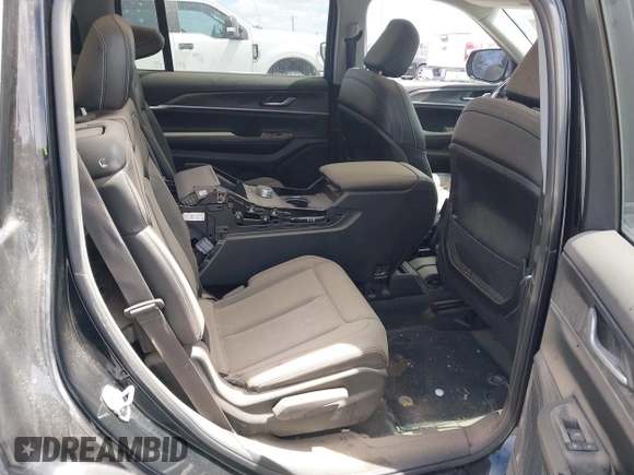 2023 Jeep Grand Cherokee Limited z VIN 1C4RJJBG4P8843652, wystawiony jako IAAI lot #41906826 z przebiegiem 18 006 mil mil oraz . Historia ofert i sprzedaży dostępna na DreamBid. Obrazek 8.