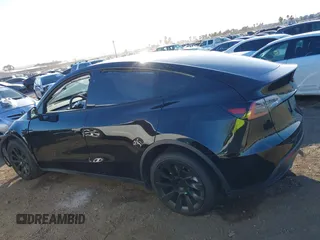 2023 Tesla Model Y Long Range with VIN 7SAYGDEE0PF907260, listed as a IAAI auction lot 41180227 with Not Provided miles and . Bid and sale history available at DreamBid. Image 14.