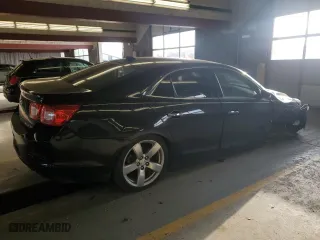 2013 Chevrolet Malibu LTZ with VIN 1G11J5SX8DF249828, listed as a Copart auction lot 82665394 with 209,370 mi miles and Salvage Title. Bid and sale history available at carsss.com. Image 3.