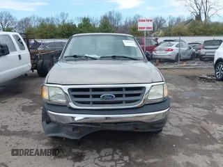 2003 Ford F-150 with VIN 2FTRX17L13CA34390, listed as a IAAI auction lot 41869497 with 114,221 mi miles and . Bid and sale history available at DreamBid. Image 13.