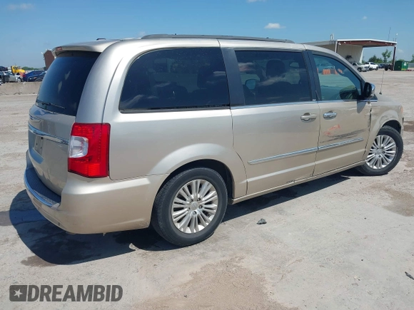 2013 Chrysler Town & Country Touring L with VIN 2C4RC1CG2DR767406, listed as a IAAI auction lot 42067814 with 75,985 mi miles and . Bid and sale history available at DreamBid. Image 4.