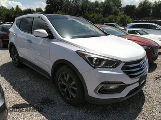 2017 Hyundai Santa Fe Ultimate z VIN 5XYZWDLA6HG424631, wystawiony jako IAAI lot #42560527 z przebiegiem 42 455 mil mil oraz . Historia ofert i sprzedaży dostępna na DreamBid. Obrazek 1.