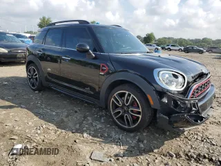 2019 MINI Countryman John Cooper Works with VIN WMZYV9C5XK3F02695, listed as a Copart auction lot 63736285 with 82,706 mi miles and Salvage title. Bid and sale history available at DreamBid. Image 4.