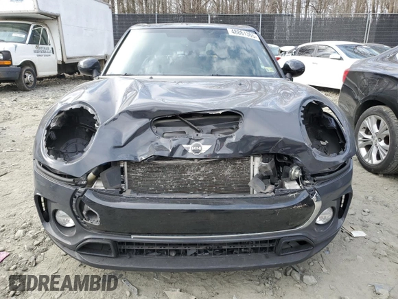 2017 MINI Clubman Cooper S with VIN WMWLU5C57H2E82584, listed as a Copart auction lot 48861365 with 90,418 mi miles and Salvage Title. Bid and sale history available at DreamBid. Image 5.
