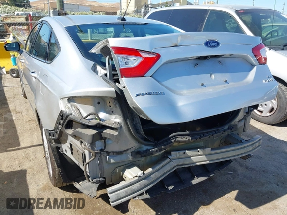 2015 Ford Fusion SE Hybrid with VIN 3FA6P0LUXFR296373, listed as a IAAI auction lot 42600980 with 76,985 mi miles and . Bid and sale history available at DreamBid. Image 6.