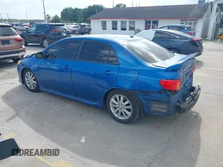 2009 Toyota Corolla with VIN 2T1BU40E69C154781, listed as a IAAI auction lot 42009936 with 180,039 mi miles. Bid and sale history available at carsss.com. Image 3.