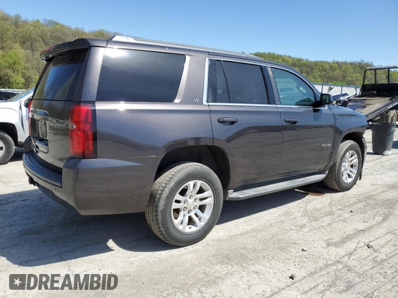 2015 Chevrolet Tahoe LT z VIN 1GNSKBKC6FR156951, wystawiony jako Copart lot #54666335 z przebiegiem 156 139 mil mil oraz Szkoda całkowita • Salvage title. Historia ofert i sprzedaży dostępna na DreamBid. Obrazek 3.