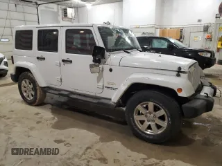 2015 Jeep Wrangler Unlimited Sahara with VIN 1C4HJWEG2FL531345, listed as a Copart auction lot 51071265 with 132,781 mi miles and Clean title. Bid and sale history available at DreamBid. Image 4.