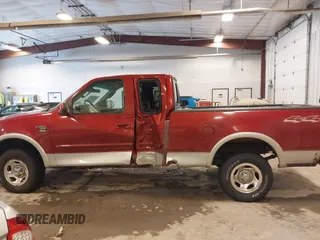 2003 Ford F-150 XL with VIN 1FTRX18L33NB82694, listed as a IAAI auction lot 41612431 with 179,664 mi miles. Bid and sale history available at carsss.com. Image 14.
