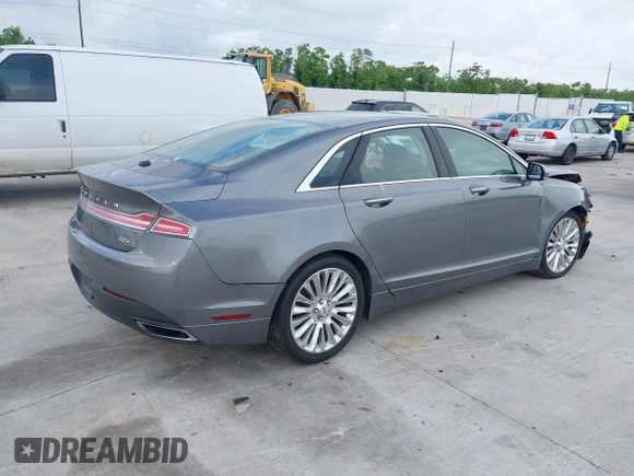 2014 Lincoln MKZ z VIN 3LN6L2G99ER834840, wystawiony jako IAAI lot #42134656 z przebiegiem 33 565 mil mil oraz . Historia ofert i sprzedaży dostępna na DreamBid. Obrazek 4.