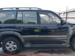 2000 Toyota Land Cruiser z VIN JT3HT05J1Y0081635, wystawiony jako IAAI lot #41938432 z przebiegiem 362 389 mil mil oraz . Historia ofert i sprzedaży dostępna na DreamBid. Obrazek 14.