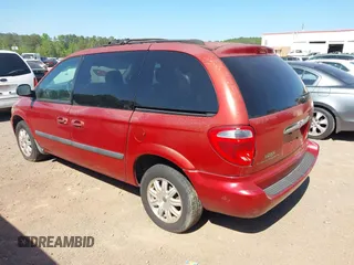 2006 Chrysler Town & Country SWB with VIN 1A4GP45R76B572053, listed as a IAAI auction lot 42015562 with 310,509 mi miles. Bid and sale history available at carsss.com. Image 3.