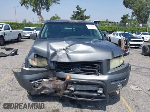 2007 Honda Ridgeline RTL with VIN 2HJYK16547H502601, listed as a IAAI auction lot 42484634 with 197,253 mi miles and . Bid and sale history available at DreamBid. Image 12.