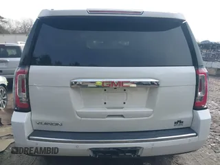 2016 GMC Yukon Denali with VIN 1GKS2CKJ9GR334645, listed as a IAAI auction lot 41781040 with 141,405 mi miles. Bid and sale history available at carsss.com. Image 16.