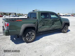 2022 Toyota Tacoma SR z VIN 3TMCZ5AN6NM479653, wystawiony jako Copart lot #47704285 z przebiegiem 57 618 mil mil oraz Szkoda całkowita • Salvage title. Historia ofert i sprzedaży dostępna na DreamBid. Obrazek 3.