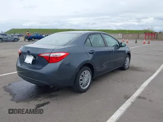 2016 Toyota Corolla L z VIN 5YFBURHE2GP397907, wystawiony jako IAAI lot #41795165 z przebiegiem 209 497 mil mil oraz . Historia ofert i sprzedaży dostępna na DreamBid. Obrazek 4.