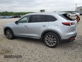 2021 Mazda CX-9 Carbon Edition с VIN JM3TCADY3M0517512, выставлен на аукционе Copart как лот 54240715 с пробегом 89 599 миль миль и Списание • Salvage title. История ставок и продаж доступна на DreamBid. Изображение 2.