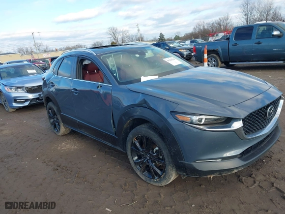 2022 Mazda CX-30 2.5 S Preferred Package with VIN 3MVDMBCL3NM422497, listed as a IAAI auction lot 41236220 with 57,752 mi miles. Bid and sale history available at carsss.com. Image 6.