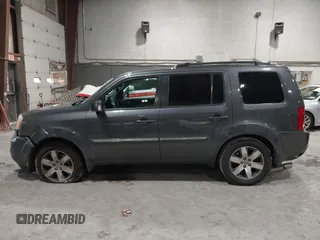 2012 Honda Pilot Touring with VIN 5FNYF4H99CB052034, listed as a IAAI auction lot 42023430 with 137,428 mi miles. Bid and sale history available at carsss.com. Image 14.
