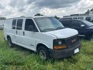 2003 GMC Savana Cargo z VIN 1GTHG35U431113170, wystawiony jako Copart lot #59030535 z przebiegiem 293 807 mil mil oraz Tytuł czysty. Historia ofert i sprzedaży dostępna na DreamBid. Obrazek 1.
