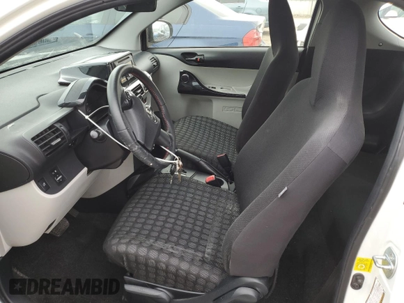 2012 Scion iQ with VIN JTNJJXB04CJ018325, listed as a Copart auction lot 49999945 with 91,507 mi miles and Salvage Title. Bid and sale history available at carsss.com. Image 7.