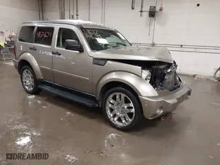 2007 Dodge Nitro SLT with VIN 1D8GU58K57W673543, listed as a IAAI auction lot 41574634 with 64,286 mi miles. Bid and sale history available at carsss.com. Image 1.