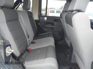 2007 Jeep Wrangler Unlimited X with VIN 1J4GA39137L101321, listed as a IAAI auction lot 42095445 with 243,583 mi miles and . Bid and sale history available at DreamBid. Image 8.