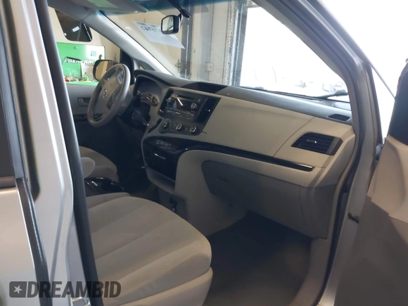 2012 Toyota Sienna LE AAS with VIN 5TDKK3DCXCS271299, listed as a IAAI auction lot 41376742 with 134,968 mi miles. Bid and sale history available at carsss.com. Image 5.