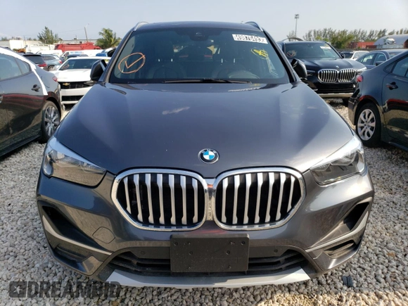 2021 BMW X1 xDrive28i with VIN WBXJG9C09M5T96327, listed as a Copart auction lot 49876493 with 42,572 mi miles and . Bid and sale history available at DreamBid. Image 5.