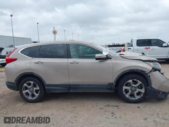 2018 Honda CR-V EX with VIN 5J6RW2H55JL003049, listed as a IAAI auction lot 41936542 with 79,057 mi miles and . Bid and sale history available at DreamBid. Image 13.