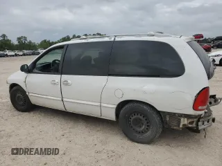 1998 Dodge Caravan SE with VIN 1B4GP44G0WB594673, listed as a Copart auction lot 70776544 with 284,046 mi miles and Salvage Title. Bid and sale history available at carsss.com. Image 2.