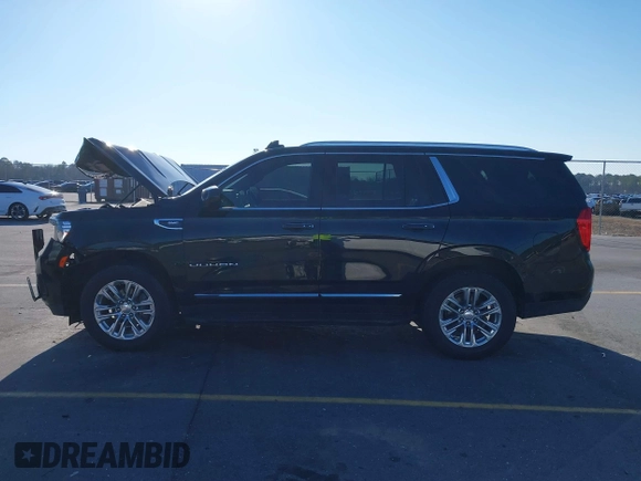 2021 GMC Yukon SLT with VIN 1GKS1BKD0MR199154, listed as a IAAI auction lot 41654239 with 105,357 mi miles. Bid and sale history available at carsss.com. Image 14.